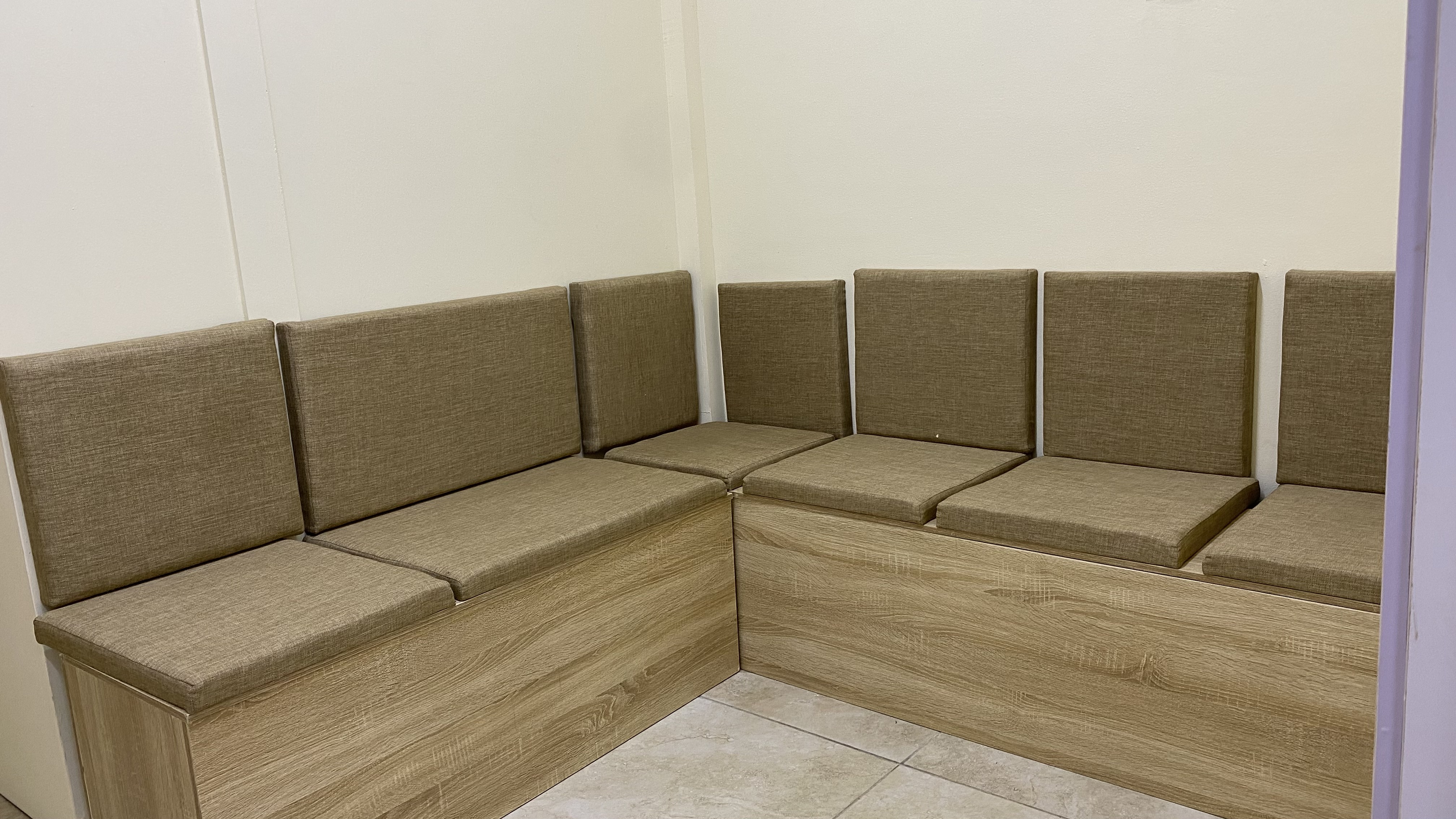 Waiting area at Befitting Hub with wraparound bench seating